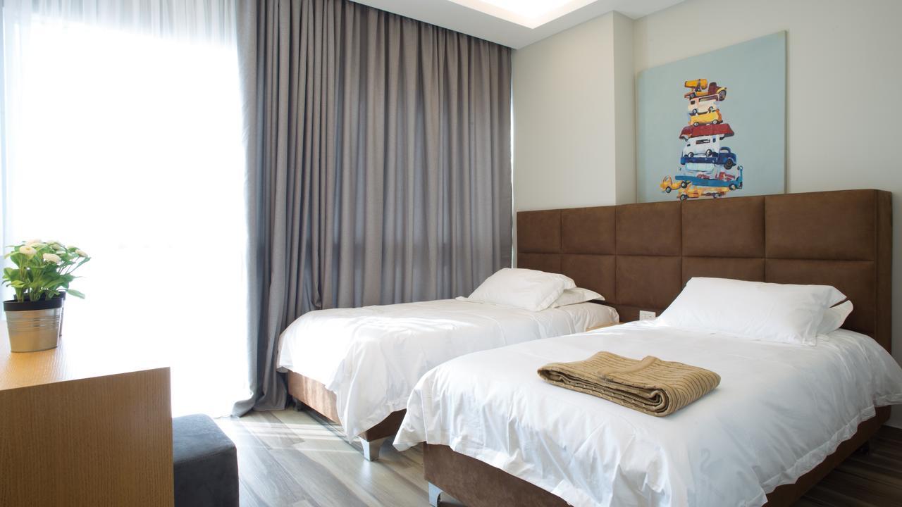 The Stay Furnished Apartments Дбає Екстер'єр фото
