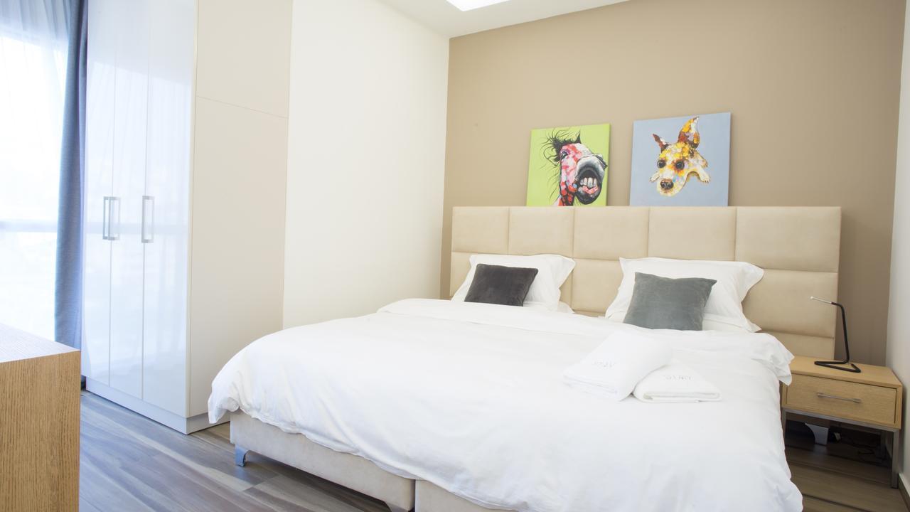 The Stay Furnished Apartments Дбає Екстер'єр фото